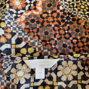 Lauren Conrad blouse size medium. Sheer material